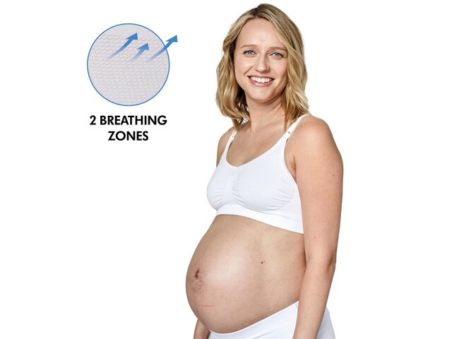 Mom wearing a white Medela Keep Cool™ Bra side view with text, "2 breathing zones"