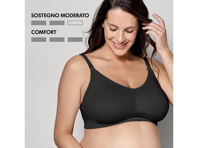 Donna che indossa un reggiseno Medela Keep Cool™ Ultra nero vista frontale con i testi “Moderate Support” e “Comfort”.