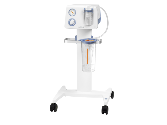 Una pompa di aspirazione chirurgica Medela Dominant Flex su una guida mobile standard con un vaso monouso da 2500 cc con fodera.